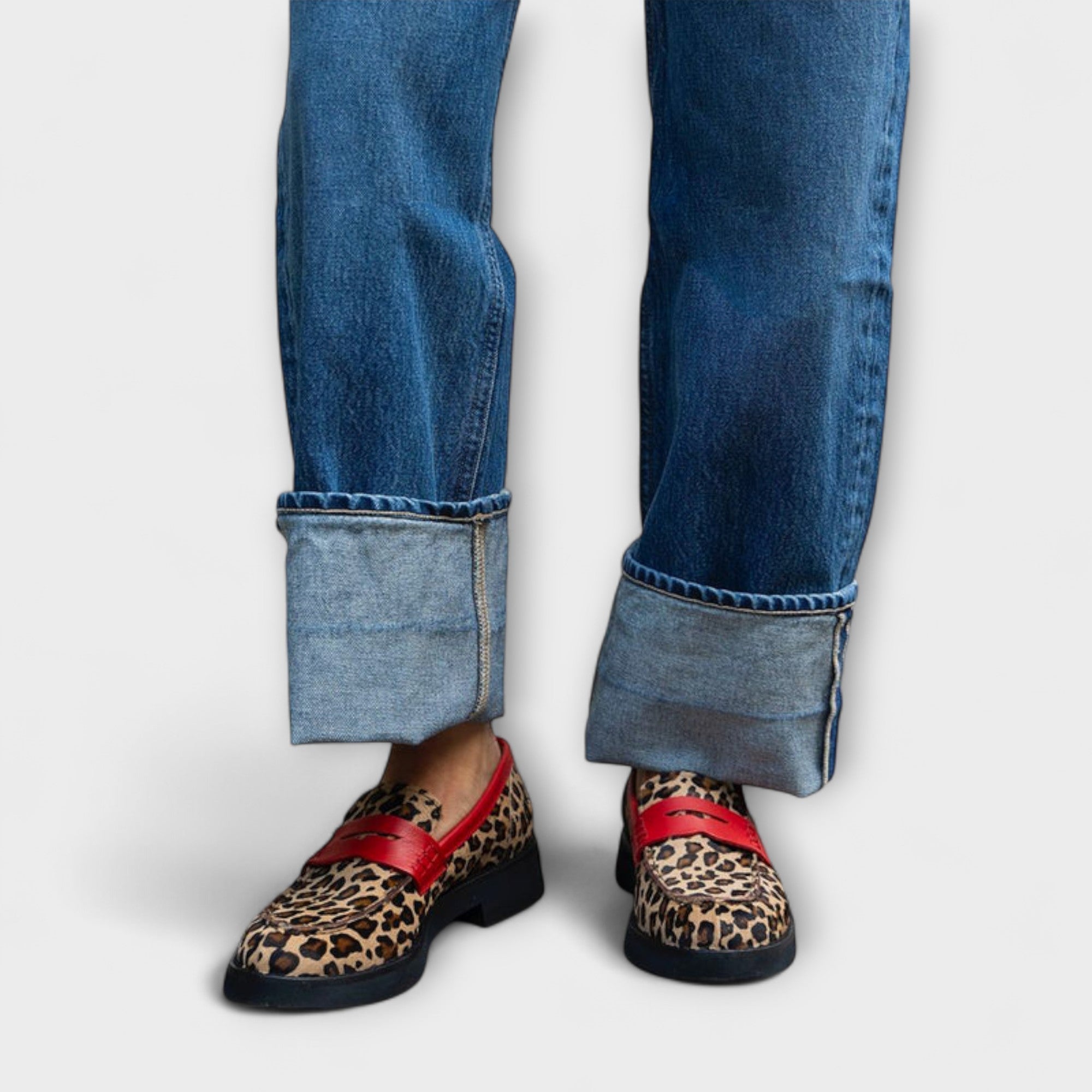 Leopard-print moccasin loafer with red strap, round toe, black sole