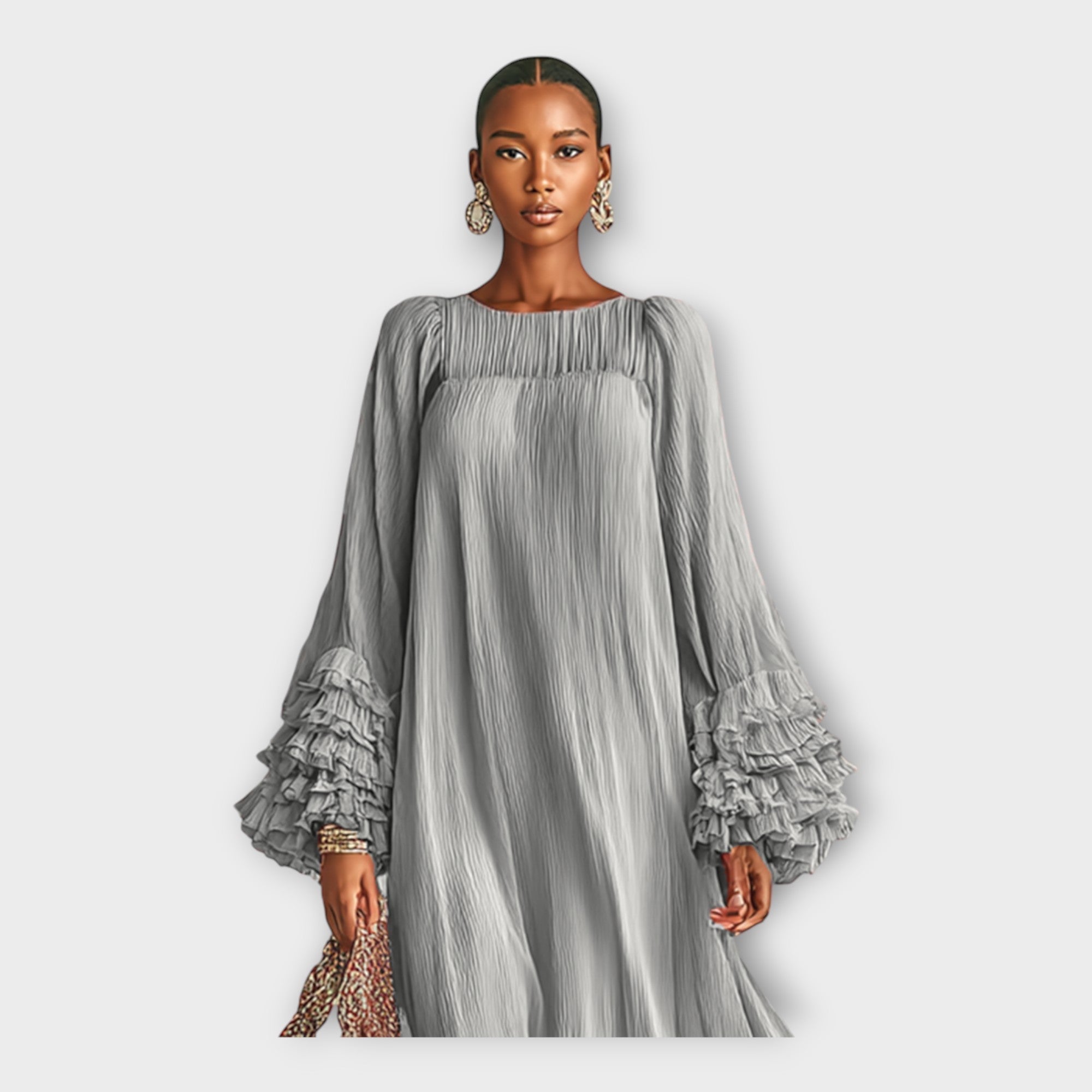 Long gray maxi dress with smocked yoke and layered ruffle cuffs