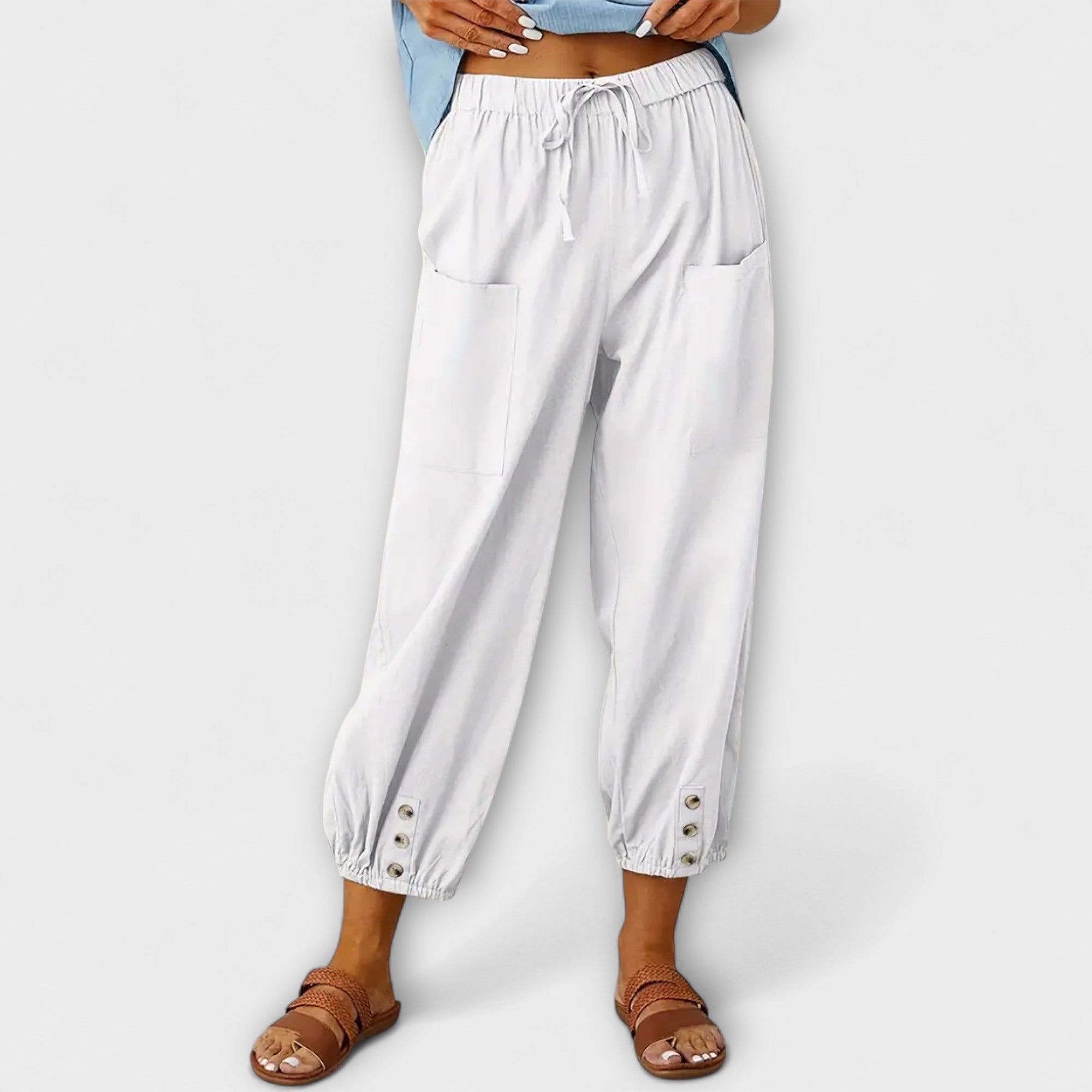 White harem pants with elastic waist and side cargo pockets