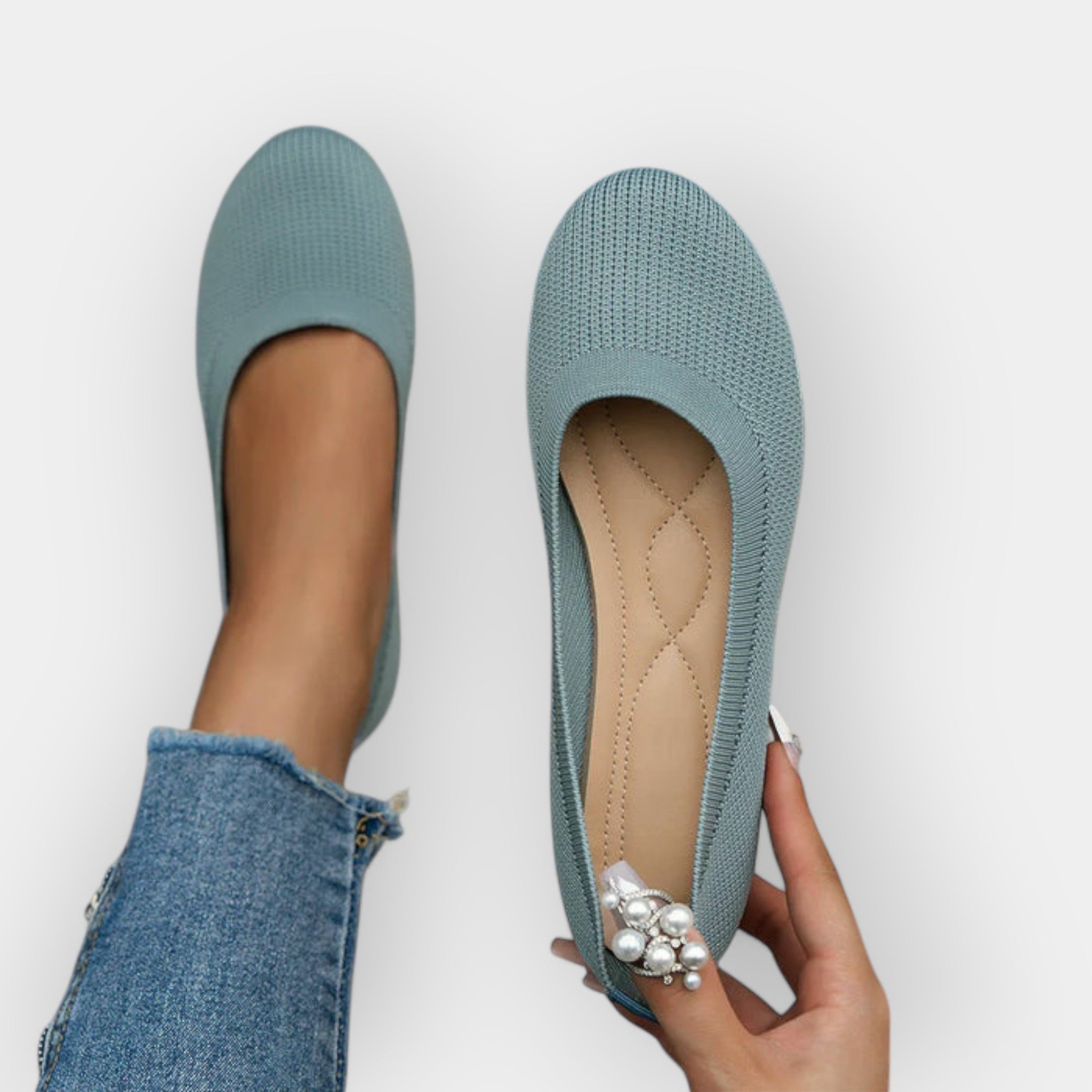 Light blue knit slip-on ballet flats with rounded toe and flat sole