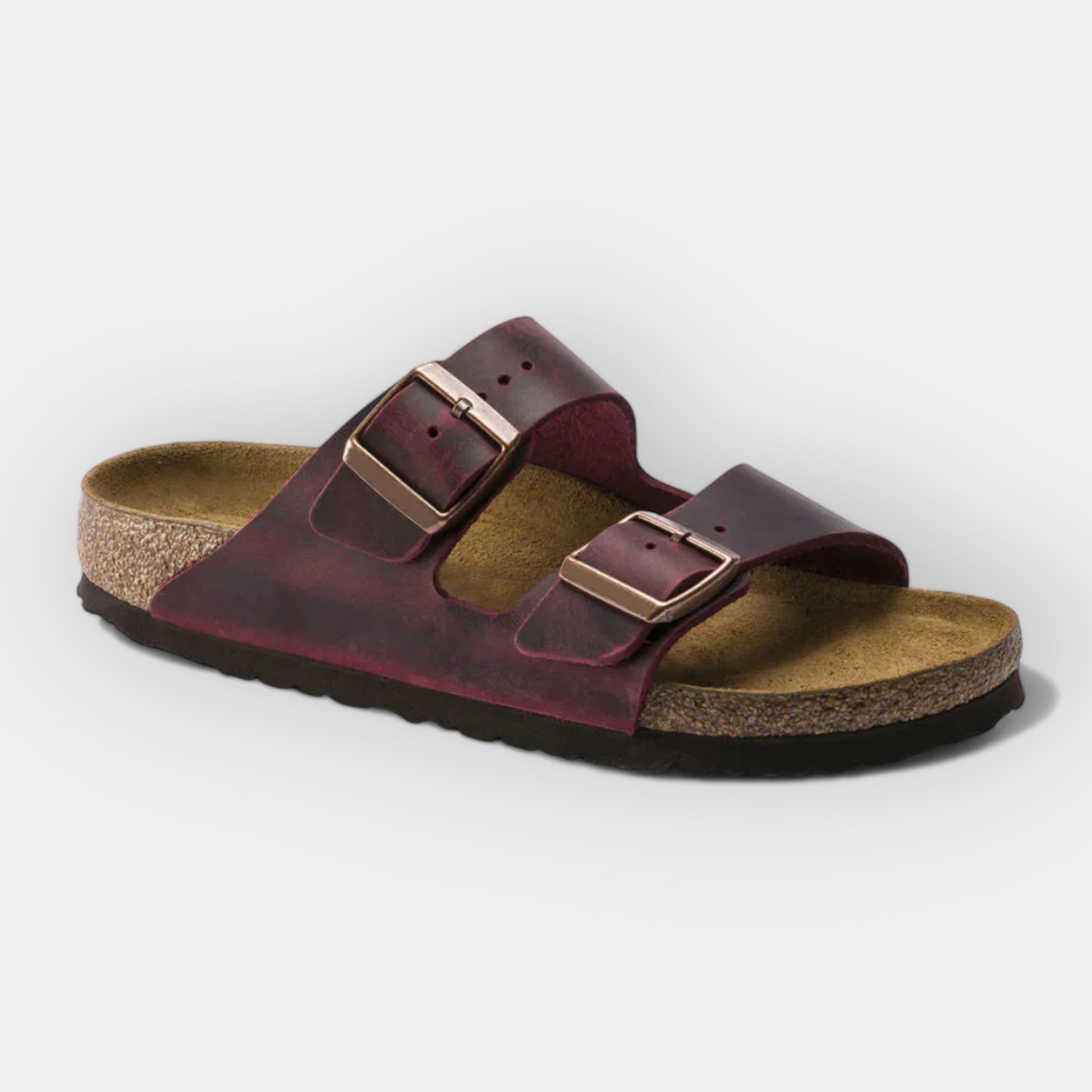 Light summer sandals in deep burgundy with two adjustable buckle straps and cork footbed