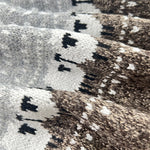 Grey knit fabric close-up with Fair Isle pattern