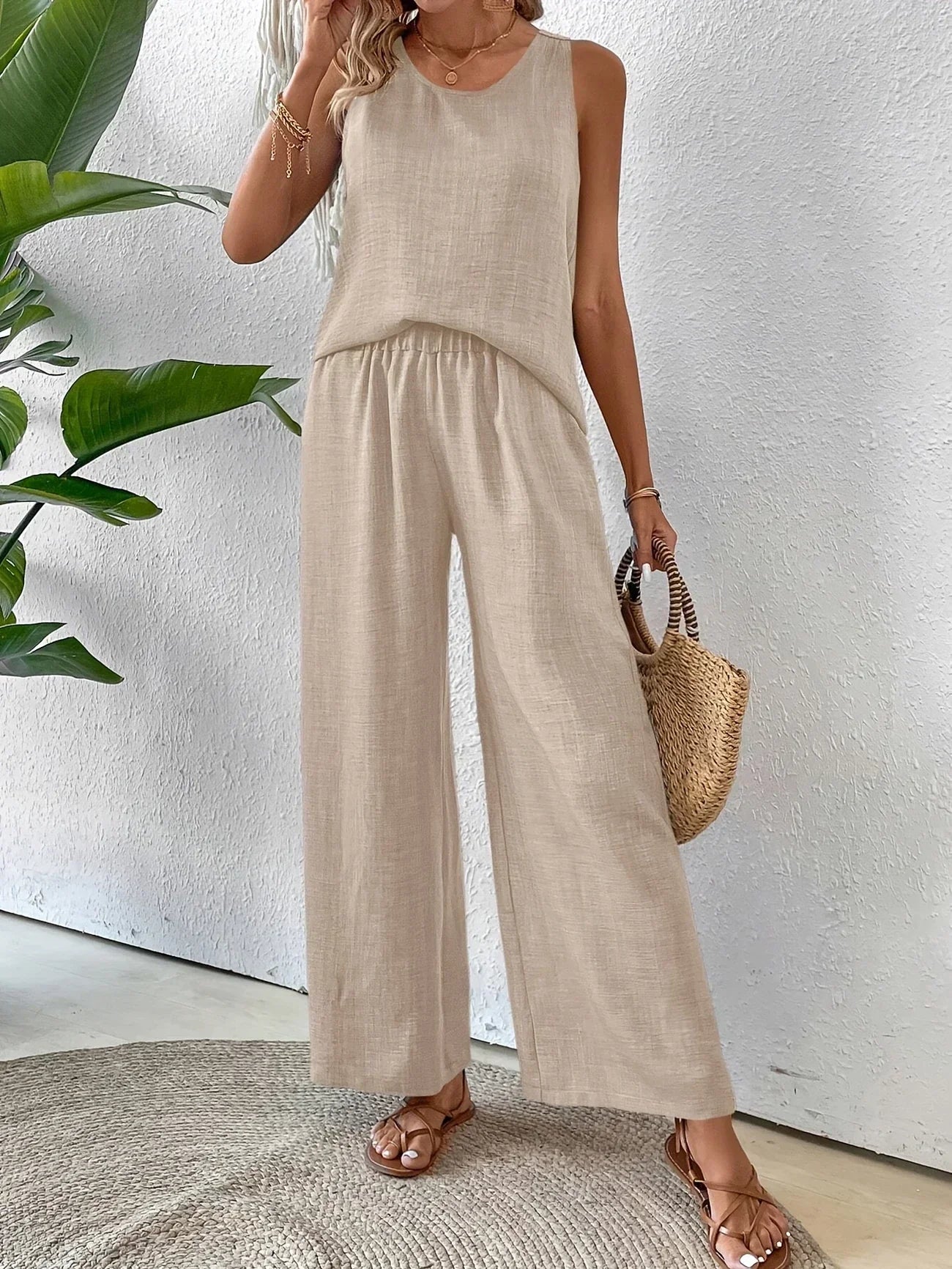 Beige sleeveless tank and wide-leg pants set with gathered tank hem