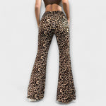 Leopard print flared trousers with straight-front seams and wide bell legs