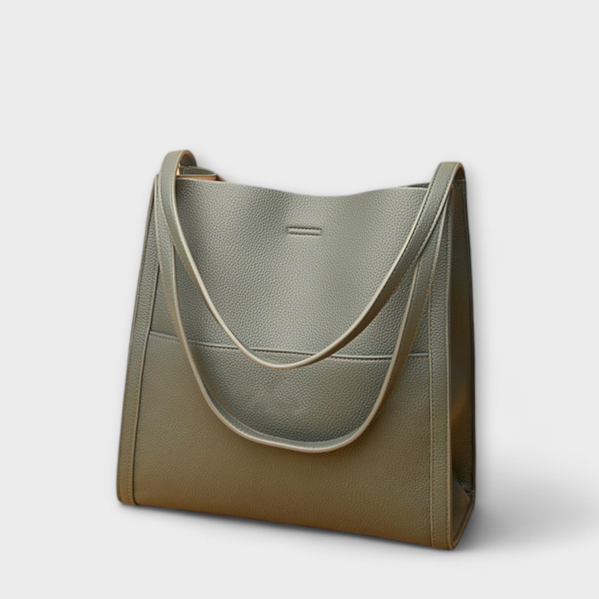 Green natural leather tote bag with curved strap handles and front tab detail