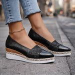 Black glitter espadrille wedge sandal with V-cut upper and ankle chain detail