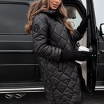 Black quilted puffer coat with hood, long sleeves, front zipper