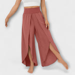 AirFlow women's wide-leg pants, rust red with elastic waist and side slit