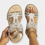Beige boho orthopaedic sandals with rhinestone straps, starburst bow, open toe
