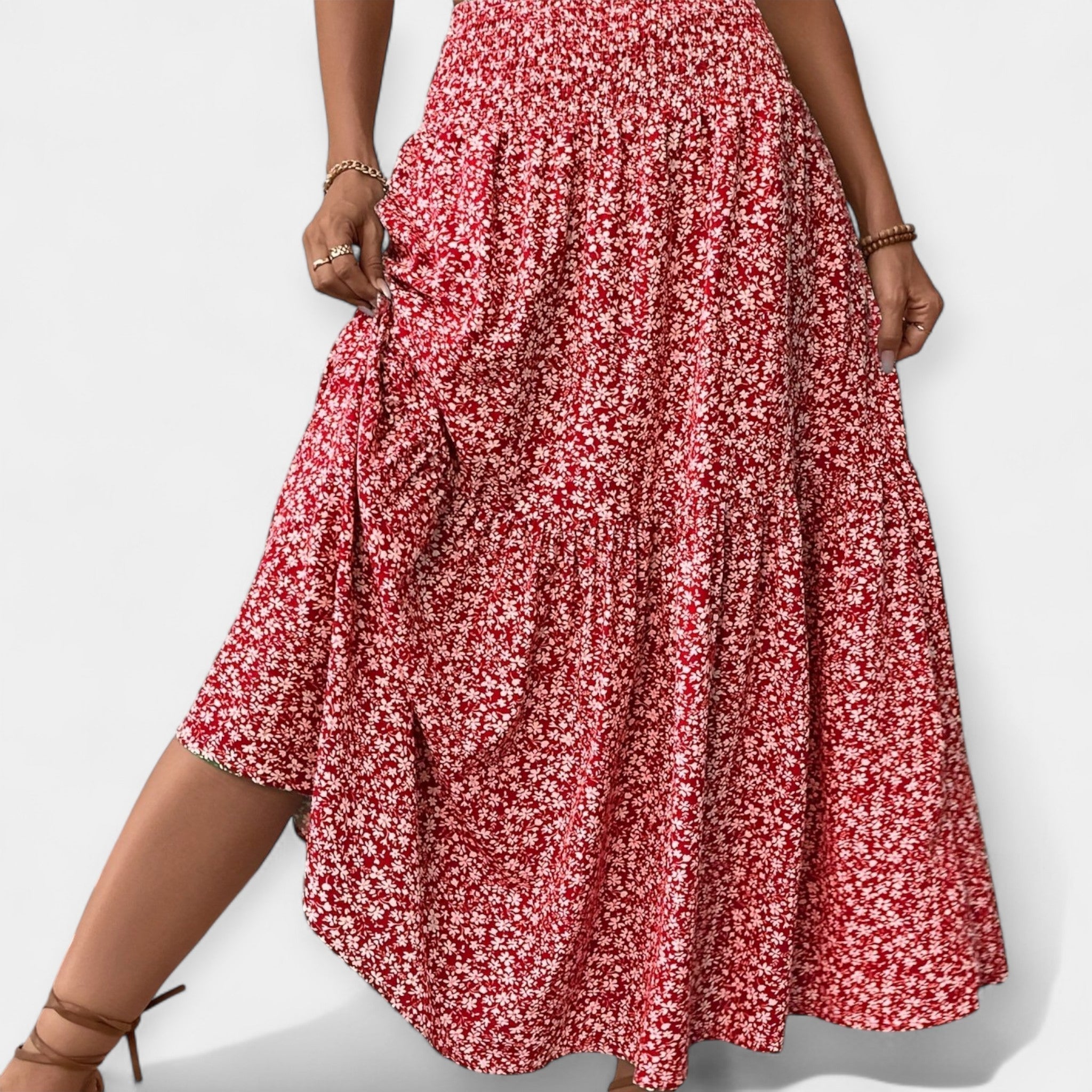 Red floral A-line skirt with gathered tiers and flowy pleats, elastic waistband