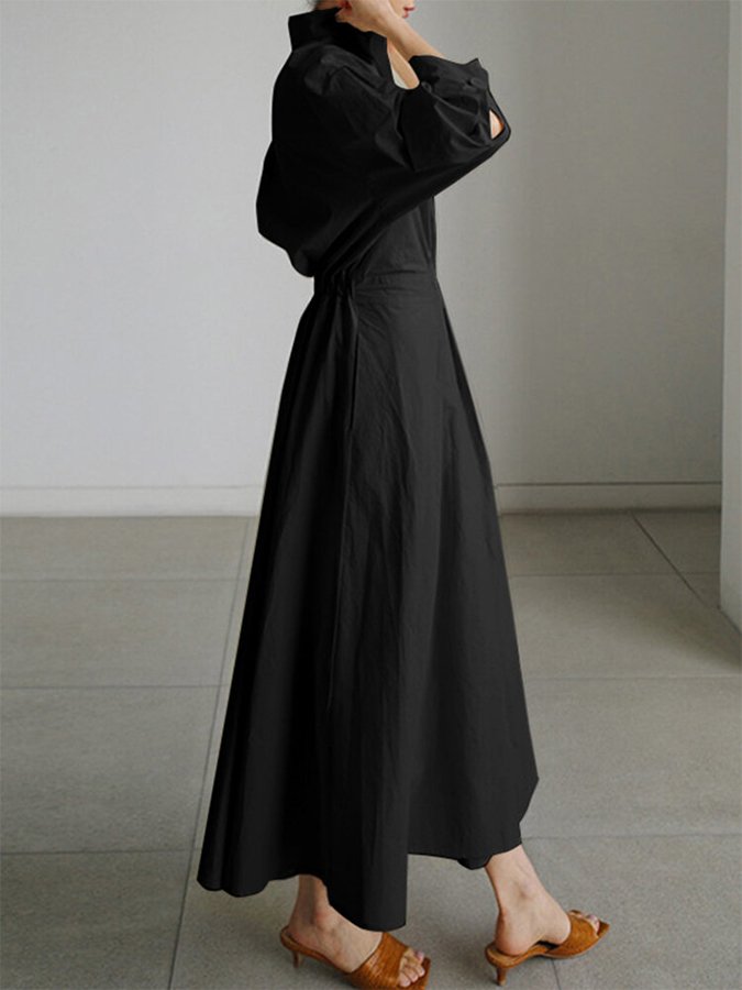 Black long button-front dress with puff sleeves and waist tie, gathered full hem