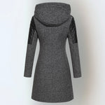 Women’s winter parka coat in dark gray with hood and quilted black sleeves, back view