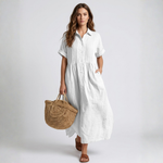White cotton shirt dress, short sleeves, button front, gathered waist, midi length.