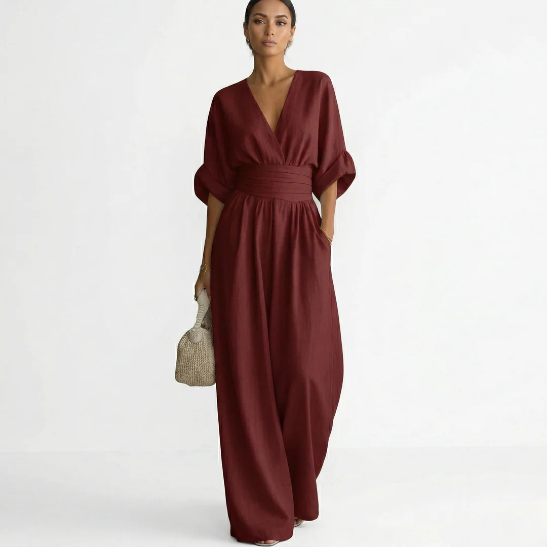 Burgundy v-neck belted jumpsuit with gathered waist and wide-leg pants