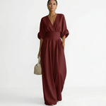 Burgundy v-neck belted jumpsuit with gathered waist and wide-leg pants