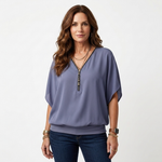 Lavender zip-front blouse with short dolman sleeves and V-neck placket