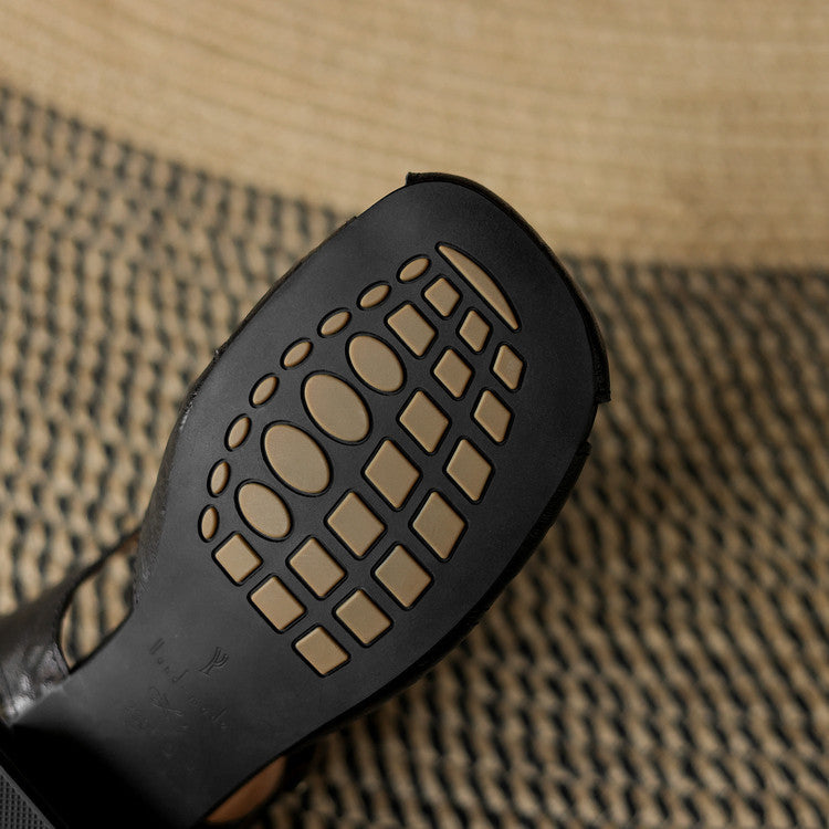 Black natural leather sandal outsole with molded tread pattern