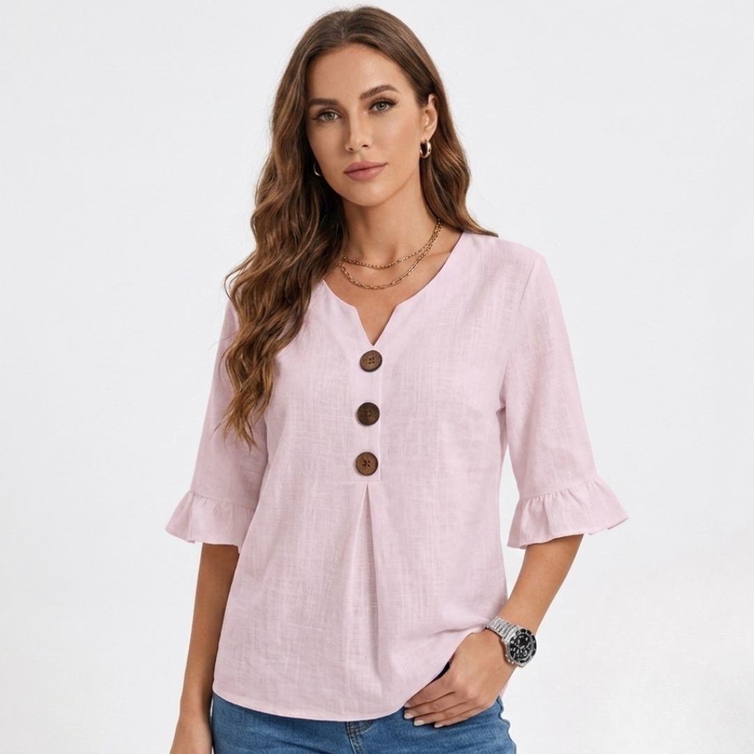 Light pink linen-look blouse with V-neck, three-button front, and flared 3/4 sleeves