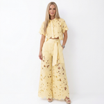 Yellow lace two-piece set with cropped short-sleeve jacket and wide-leg pants