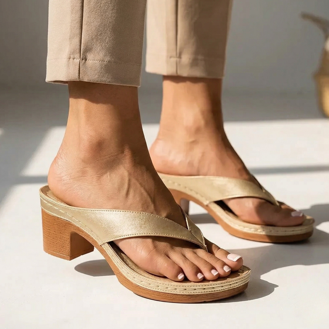Beige-gold slide sandal with wide strap and cushioned platform sole