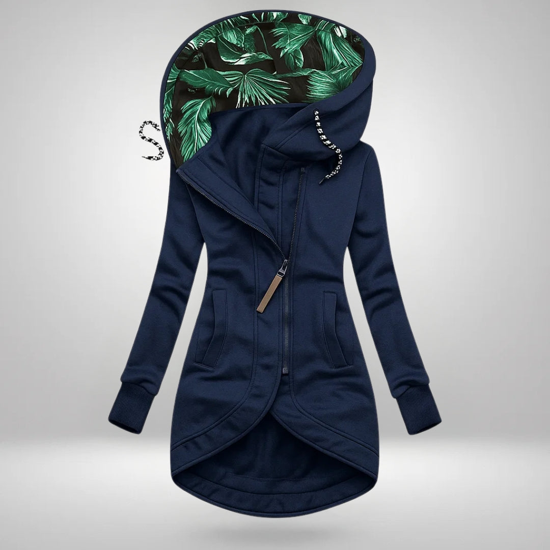 Women’s winter coat in navy, zip-front hood with green leafy inner lining