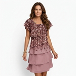 Gabriella short-sleeve pink dress with V-neck, sparkly speckled top and tiered skirt