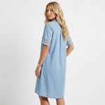 Light blue denim shirt dress with short sleeves, contrast stripe cuffs, patch pockets