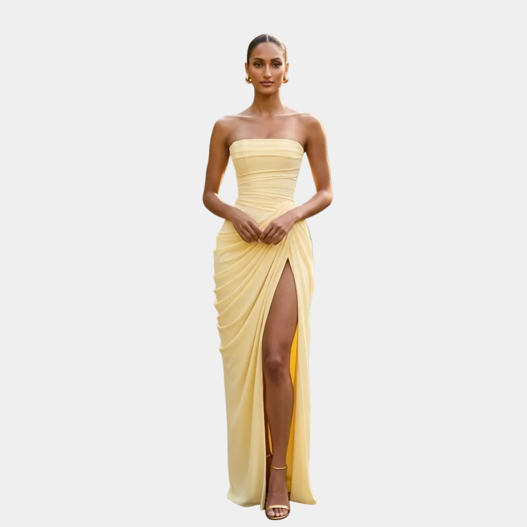 Strapless maxi gala dress with corset bodice and draped skirt slit, pale yellow