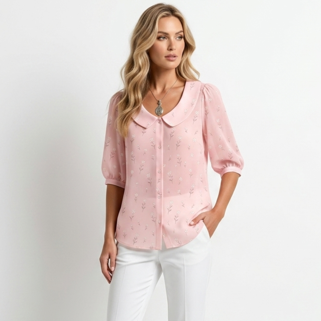 Pink button-front blouse with small botanical print, collared neckline, puffed sleeves