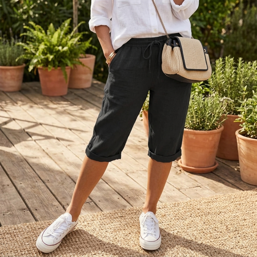 Beatrice cotton drawstring capri shorts, dark black with cuffed hem and pockets