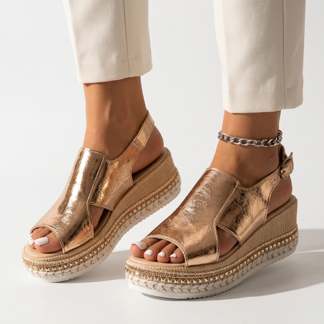 Gold metallic orthopedic wedge sandals with open toe, espadrille trim, ankle strap
