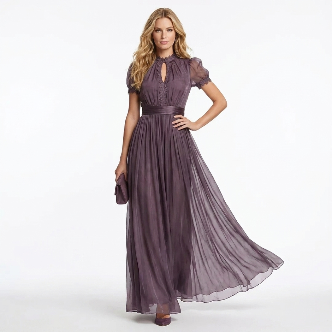 Long violet dress with deep V neckline and gathered waist, flowing sheer skirt