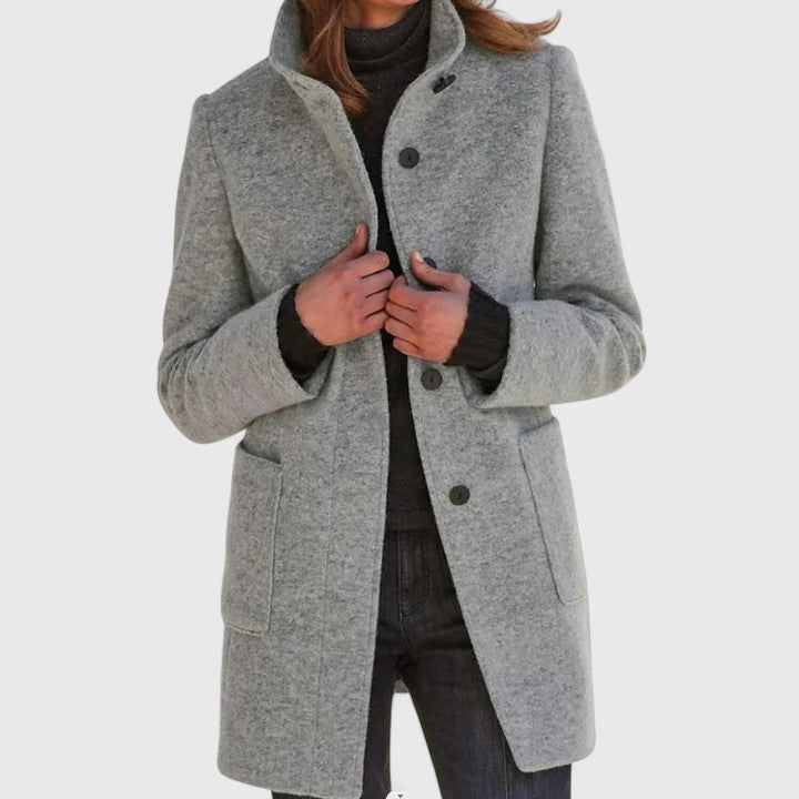 Gray classic button-front coat with notch lapels, long sleeves, and side pockets