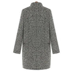 Black-and-white herringbone long overcoat, back view, full sleeves