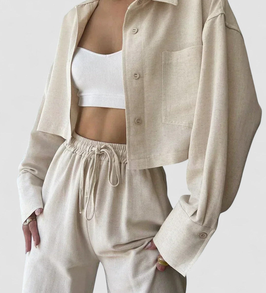 Light beige collared button-up top with drawstring waist pants, two-piece set