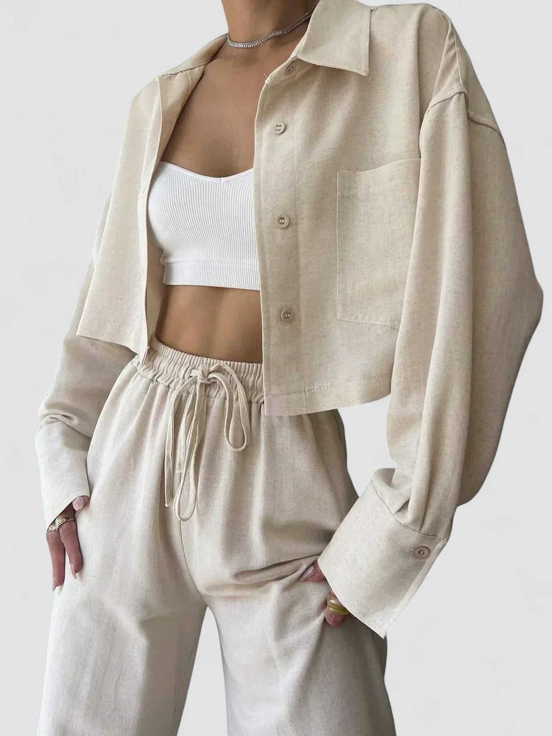 Light beige collared button-up top with drawstring waist pants, two-piece set