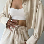 Light beige collared button-up and matching drawstring waist jogger pants set