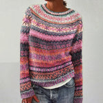 Multicolor knit pullover sweater with crew neck, long sleeves, and pink striped pattern