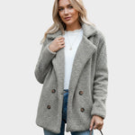 Light gray sherpa puffer jacket with wide lapels, double-breasted buttons, and long sleeves
