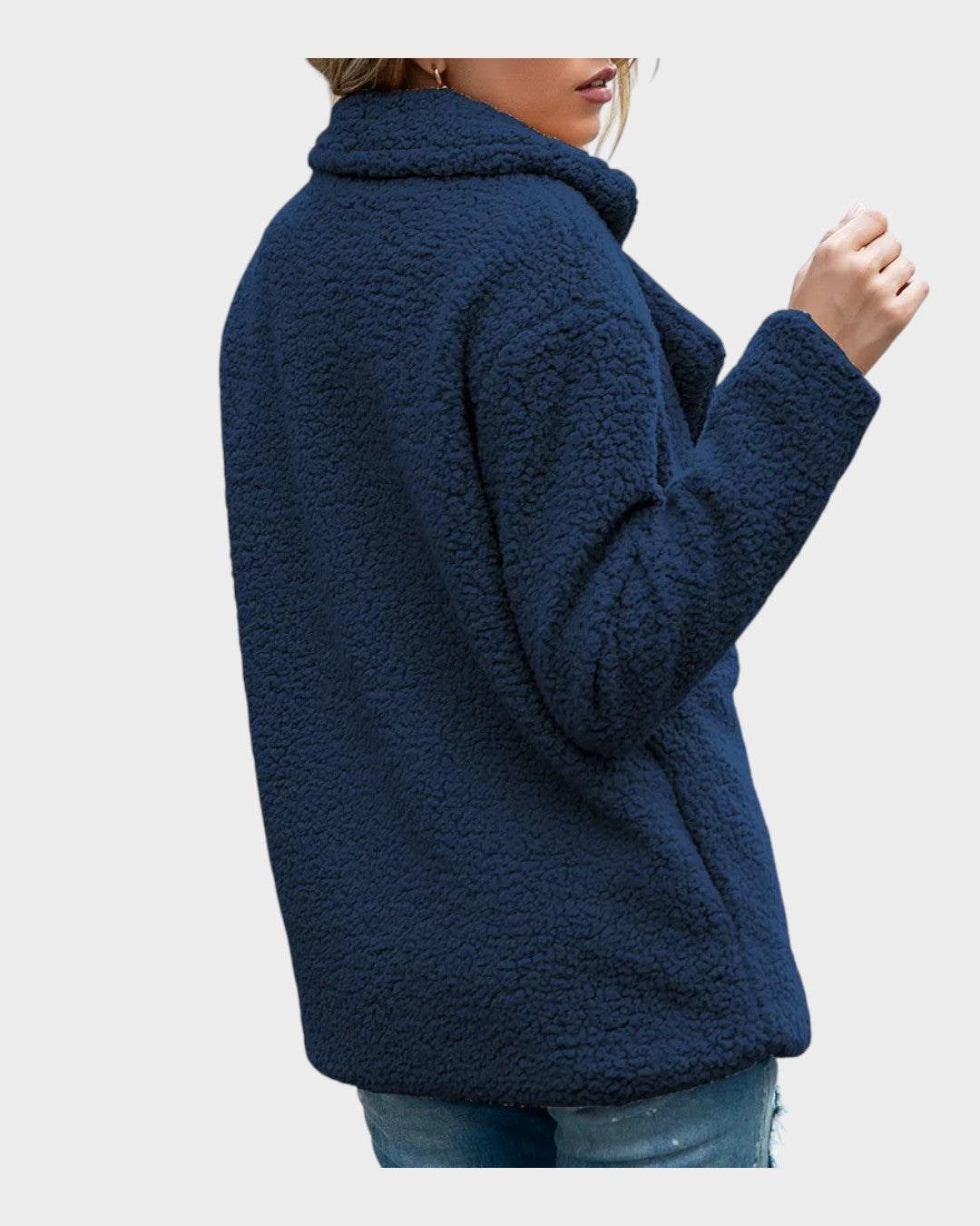 Navy sherpa puffer jacket back view with thick textured fabric and long sleeves