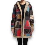 Long hooded patchwork coat with sherpa lining and multicolor geometric blocks