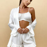 Angie satin pajama set in white: ruched cropped camisole with robe and ruffle shorts