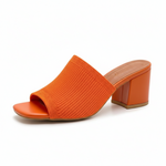 Orange knit mule sandals with thick block heel and open toe