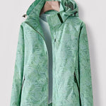 Light green hooded jacket with full-zip, leaf pattern, and black trim