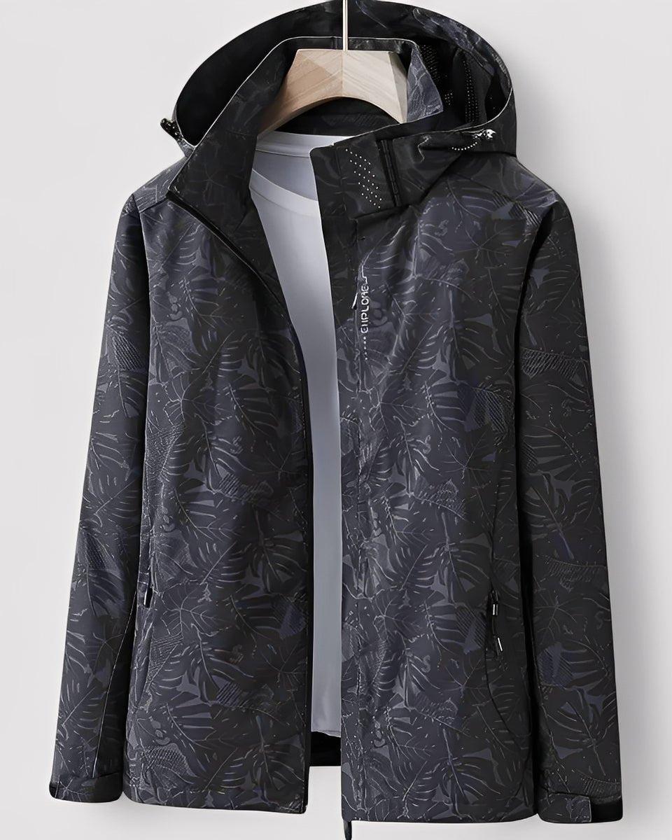 Black hooded jacket with full-zip and leaf pattern, black zip accents