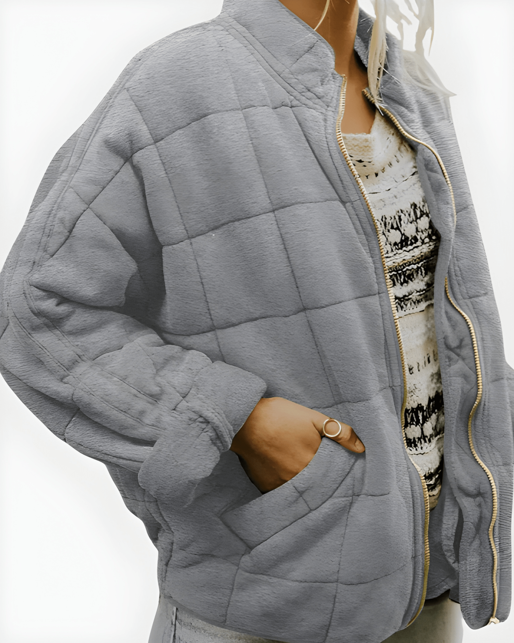 Gray quilted puffer jacket with full-zip front and side pockets, stand collar.