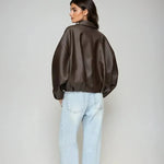 Brown zip-front oversized jacket, back view, belted waist