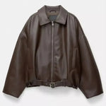 Brown oversized zip-up jacket on hanger with pointed collar and belted waist