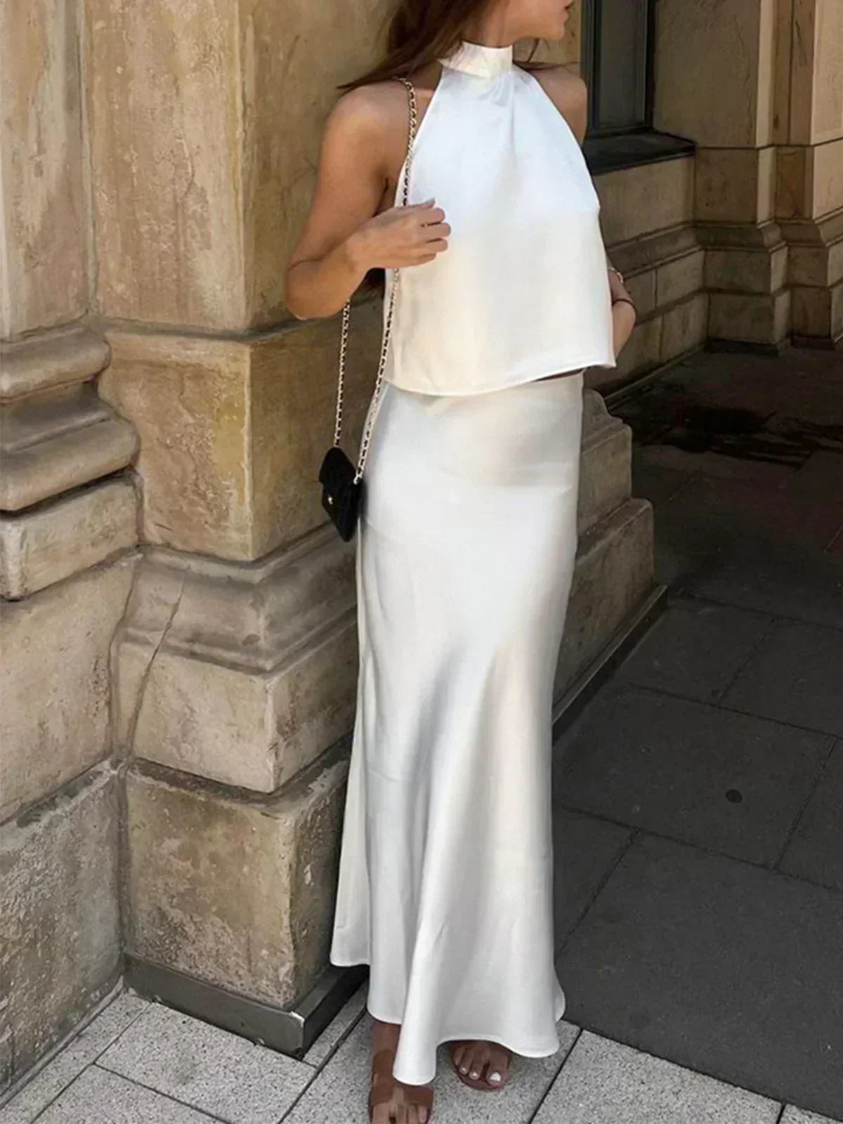 White satin sleeveless crop top and long maxi skirt, front view