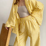 Yellow striped wrap top and high-waist drawstring wide-leg pants